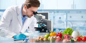 food quality control expert inspecting specimens of groceries in the laboratory