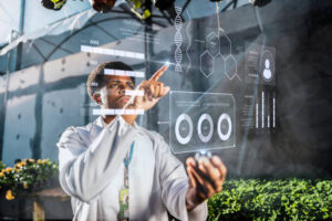 young botanical man analyzing data in the greenhouse
